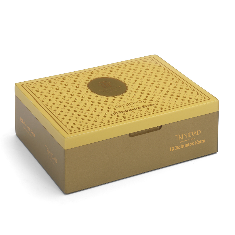 Gold-colored Trinidad cigar humidor on a white background